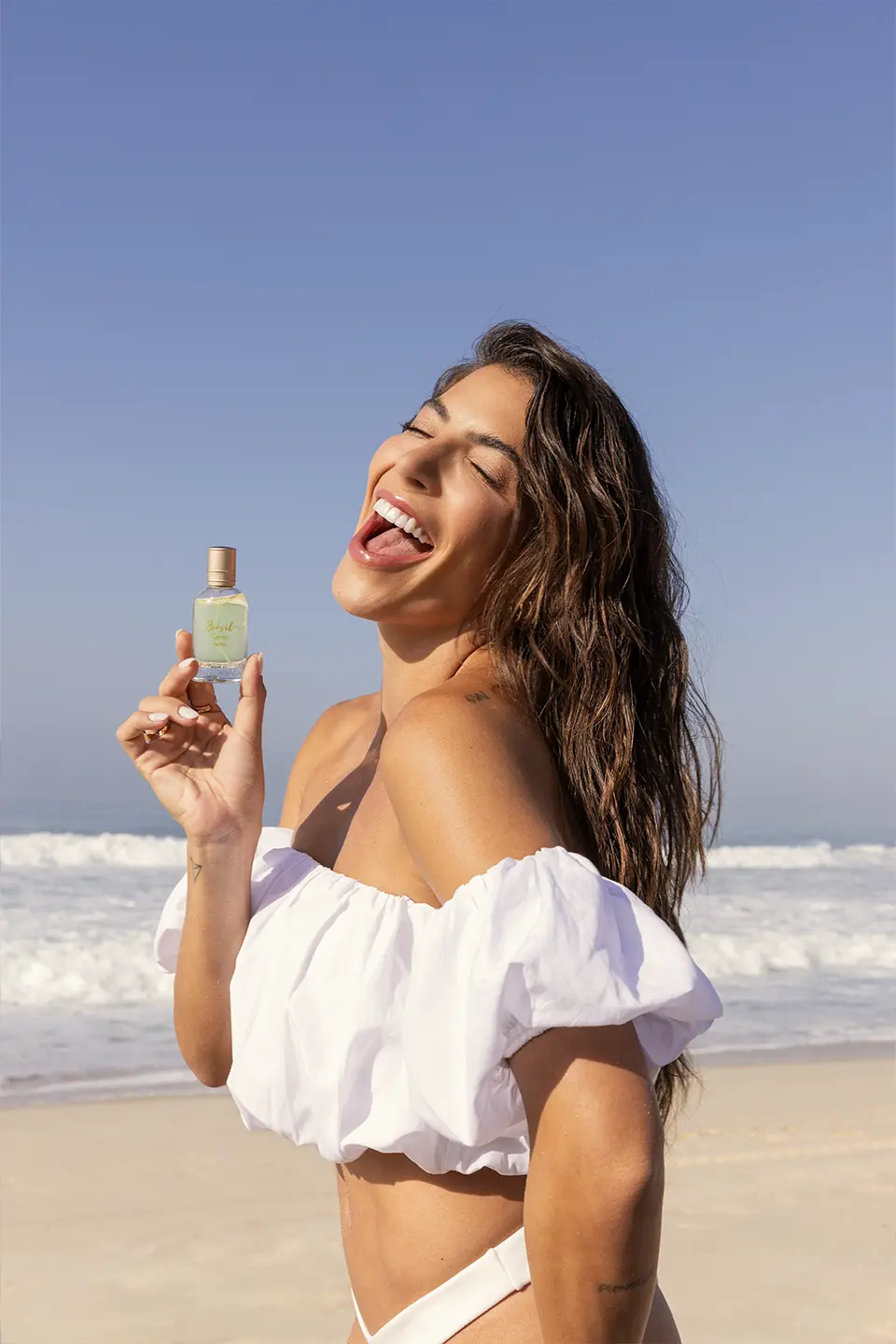 Campanha de perfumaria na praia